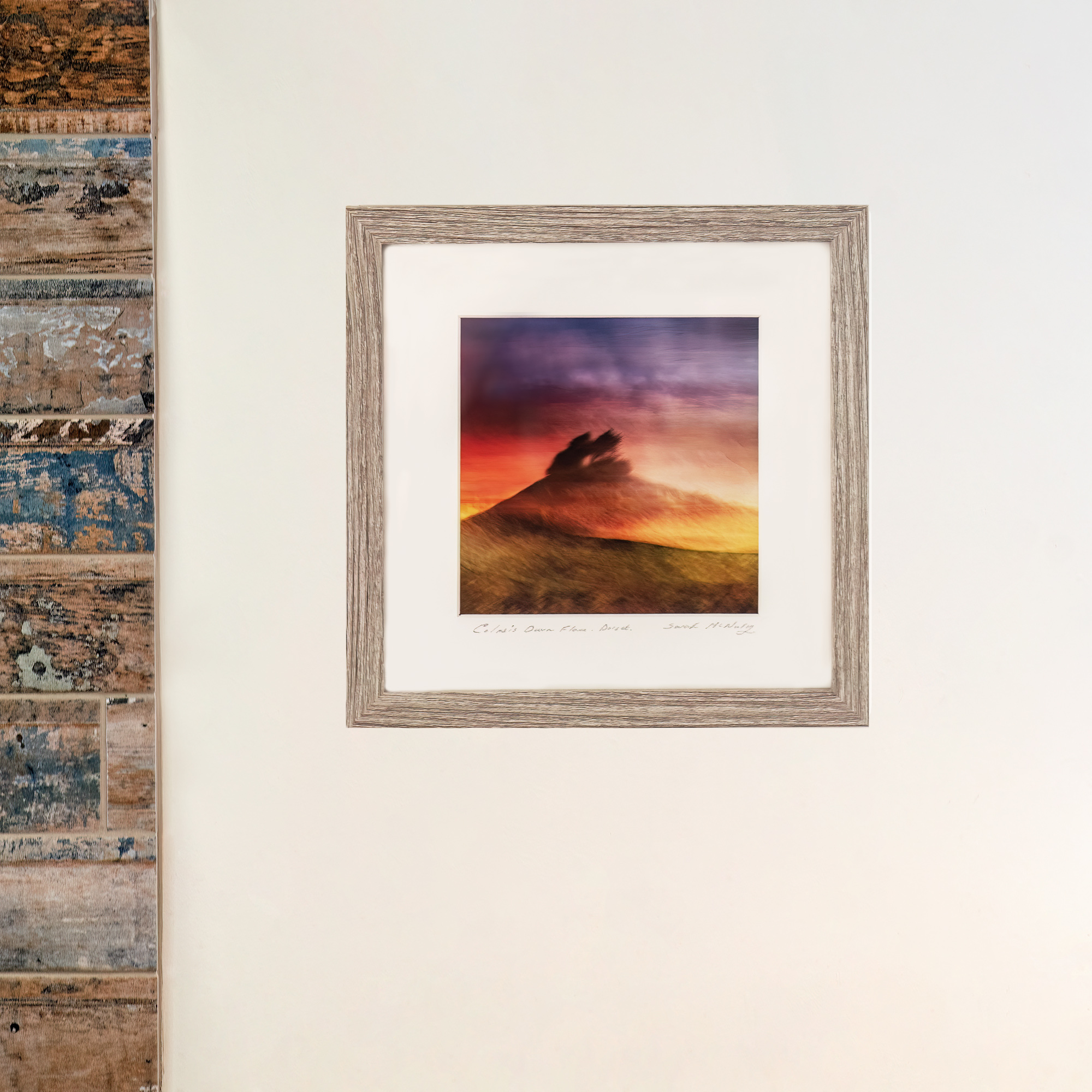 Colmers Dawn Flame is a small framed fine art print of Colmers Hill in Symondsbury Dorset with a vibrant Dawn sunrise.
