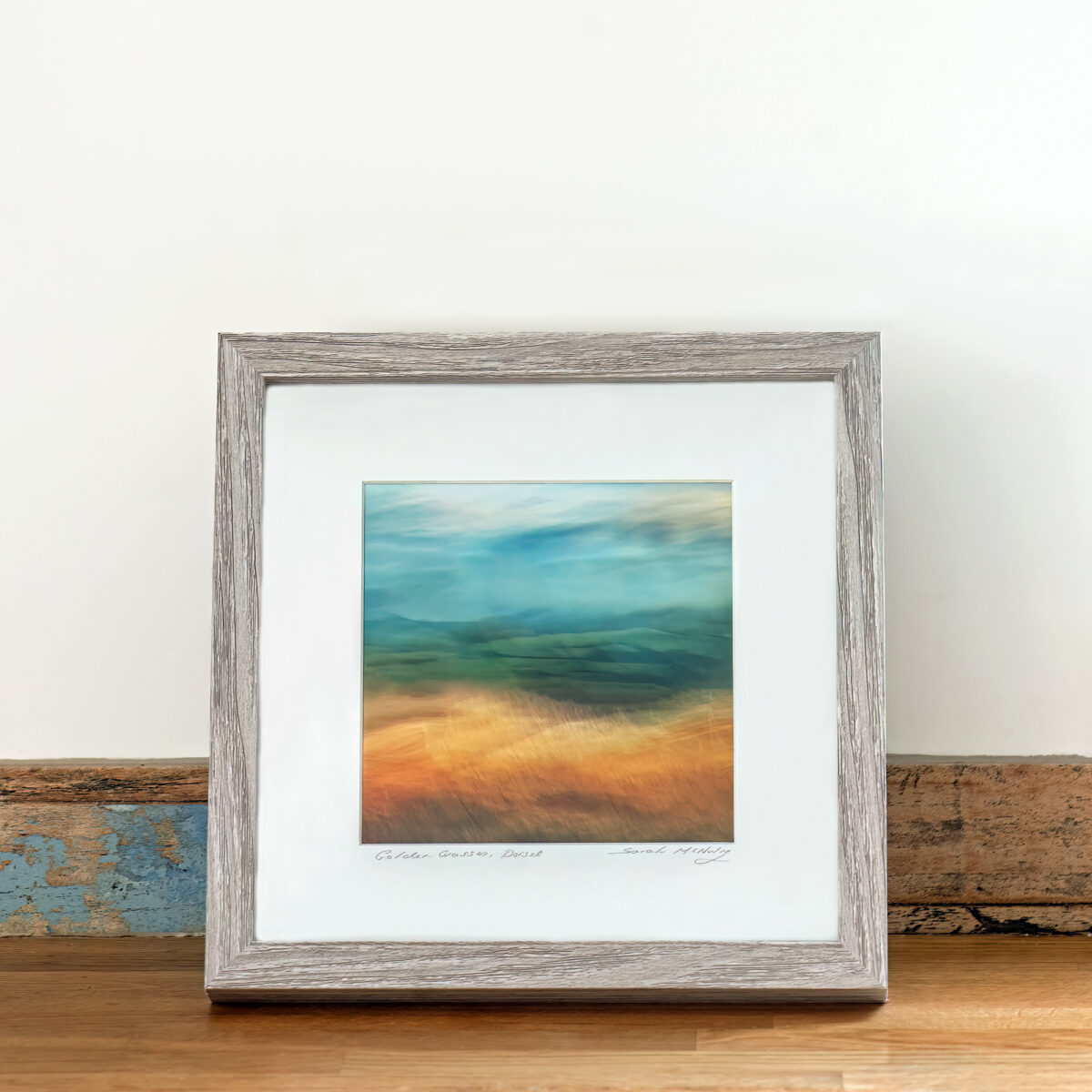 Golden Grasses is a small framed fine art print of the countryside at Symondsbury in Dorset