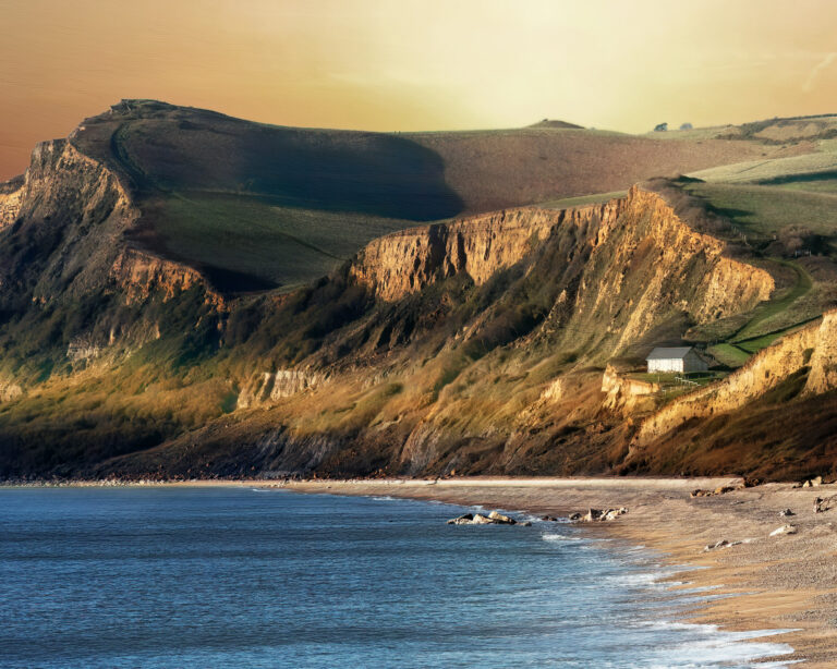 The Golden Coast. Fine art print of the view towards West Bay in Dorset at Sunset.